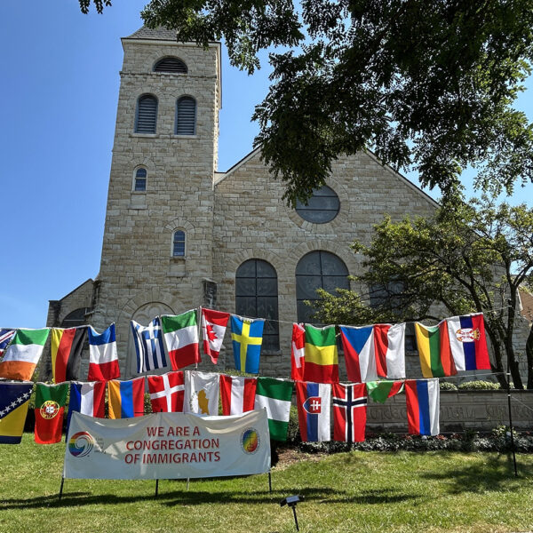 FCC La Grange with flags of all nations in front